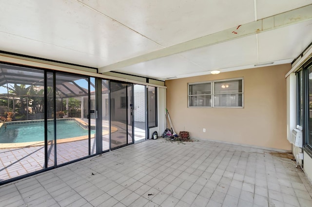1746 W Terrace Dr, Lake Worth, FL 33460 - unfurnished sunroom with plenty of natural light and beamed ceiling
