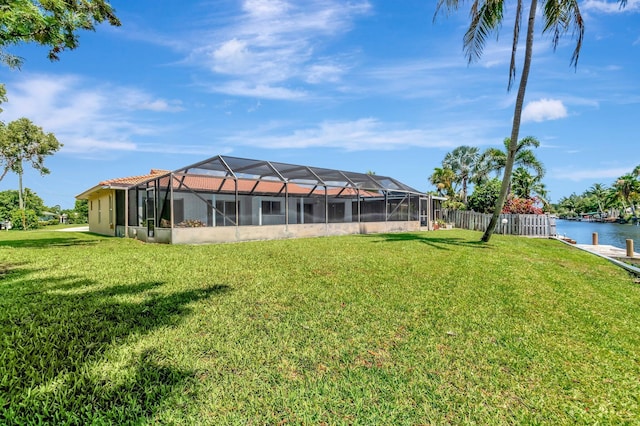 1746 W Terrace Dr, Lake Worth, FL 33460 - view of yard featuring glass enclosure and a water view