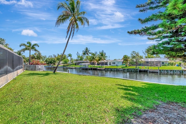 1746 W Terrace Dr, Lake Worth, FL 33460 - view of grassy yard featuring a water view and a residential view