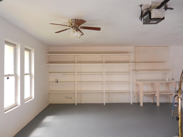 1746 W Terrace Dr, Lake Worth, FL 33460 - garage with a ceiling fan and a garage door opener