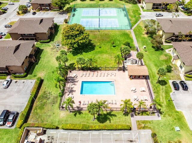 birds eye view of property with a residential view