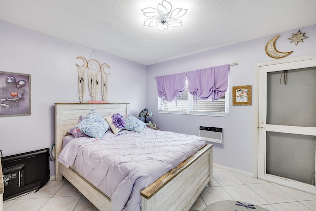 bedroom with a wall mounted air conditioner and marble finish floor