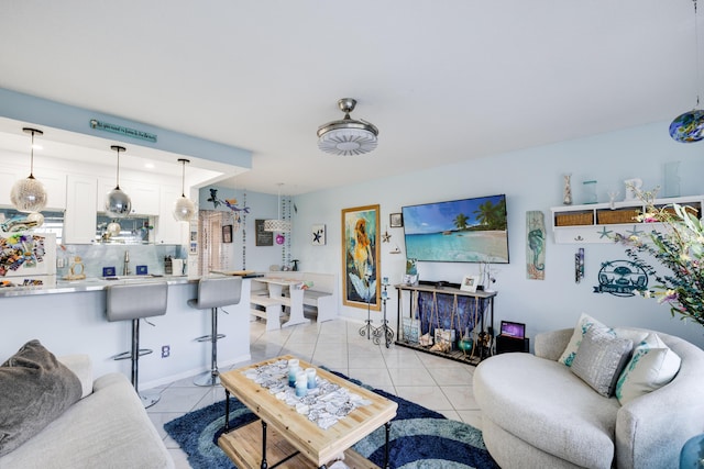 living room with light tile patterned floors