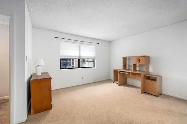 2050 Oleander Blvd Unit 3-206, Fort Pierce, FL 34950 - unfurnished office featuring light colored carpet, a textured ceiling, and baseboards