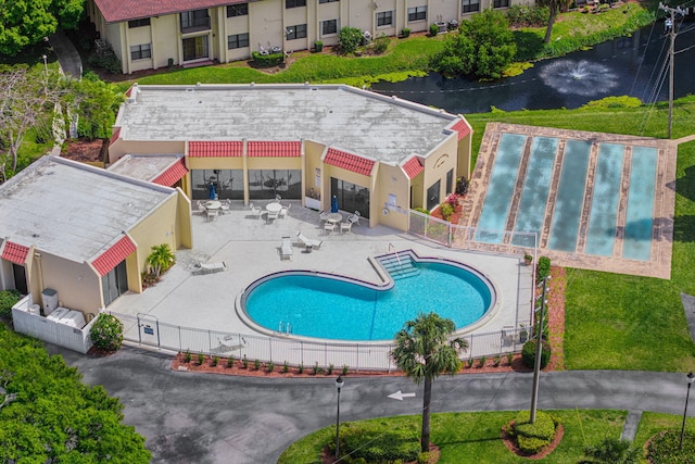 2050 Oleander Blvd Unit 3-206, Fort Pierce, FL 34950 - community pool featuring a patio