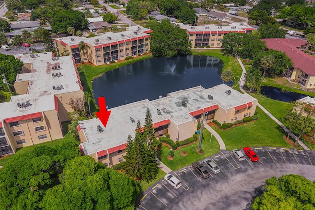2050 Oleander Blvd Unit 3-206, Fort Pierce, FL 34950 - drone / aerial view of a large body of water and apartment complex / building
