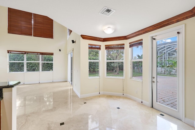 9682 Campi Dr, Lake Worth, FL 33467 - unfurnished room with visible vents, baseboards, and marble finish floor