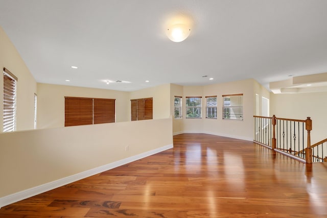 9682 Campi Dr, Lake Worth, FL 33467 - unfurnished room featuring wood finished floors, baseboards, and recessed lighting