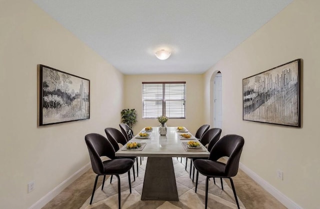 9682 Campi Dr, Lake Worth, FL 33467 - dining space with carpet floors and baseboards