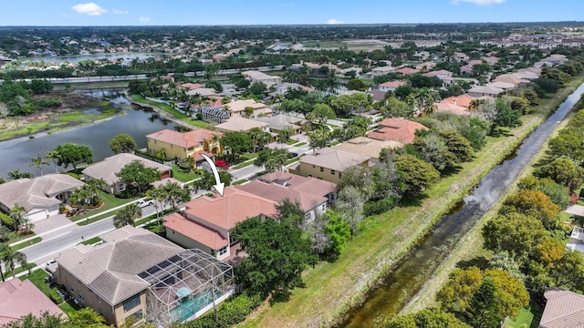 9682 Campi Dr, Lake Worth, FL 33467 - aerial view featuring a water view and a residential view