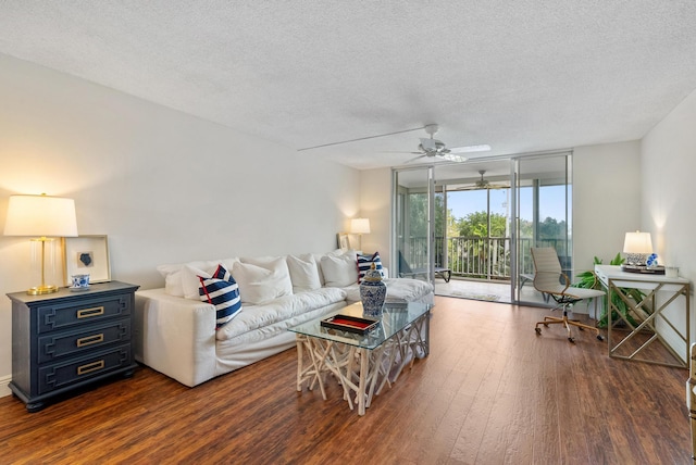 2809 Florida Blvd Unit 307, Delray Beach, FL 33483 - living area featuring dark wood-style flooring, ceiling fan, a textured ceiling, and floor to ceiling windows