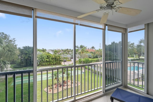 2809 Florida Blvd Unit 307, Delray Beach, FL 33483 - unfurnished sunroom featuring a healthy amount of sunlight, ceiling fan, and tile patterned flooring