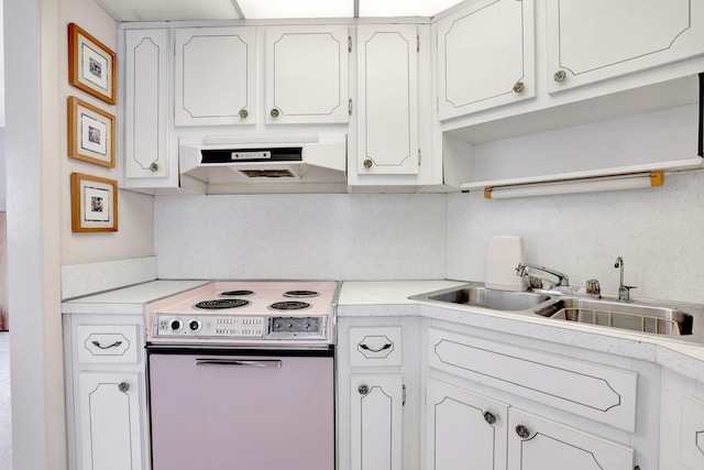 1021 Crystal Lake Dr Unit 109, Deerfield Beach, FL 33064 - kitchen with a sink, open shelves, under cabinet range hood, electric stove, and white cabinets