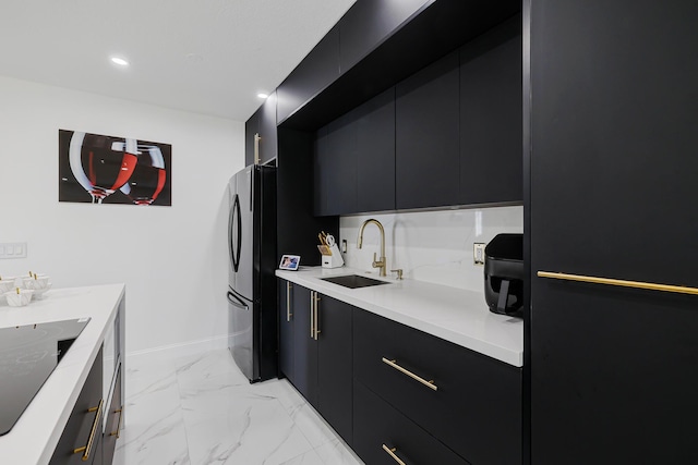 180 NW 18th St, Pompano Beach, FL 33060 - kitchen featuring a sink, black appliances, and dark cabinetry