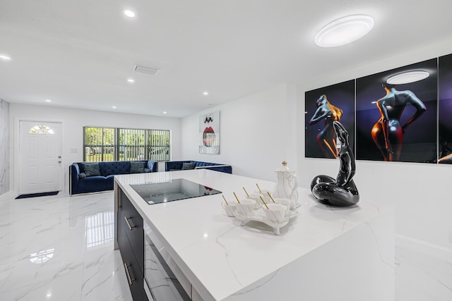 180 NW 18th St, Pompano Beach, FL 33060 - kitchen with recessed lighting, open floor plan, marble finish floor, and black electric cooktop