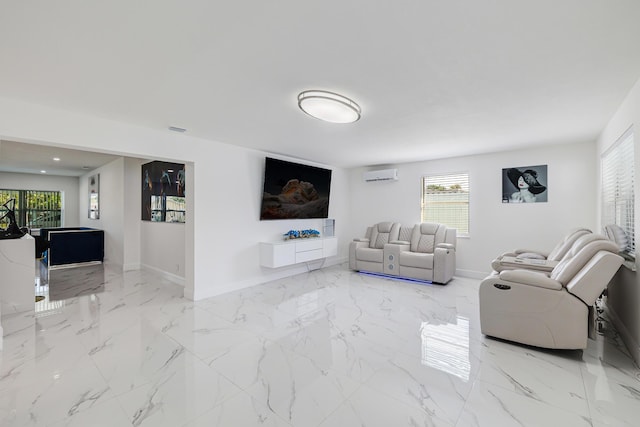 180 NW 18th St, Pompano Beach, FL 33060 - living room featuring an AC wall unit, baseboards, marble finish floor, and visible vents