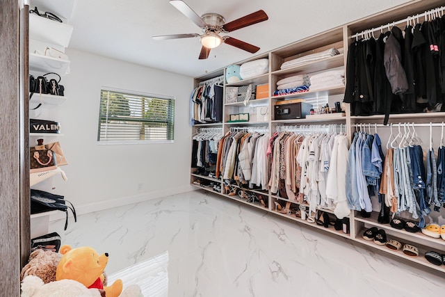 180 NW 18th St, Pompano Beach, FL 33060 - spacious closet featuring a ceiling fan and marble finish floor