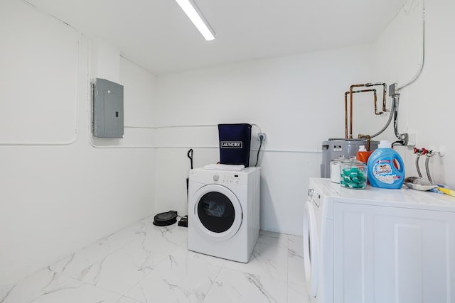 180 NW 18th St, Pompano Beach, FL 33060 - clothes washing area featuring water heater, electric panel, independent washer and dryer, laundry area, and marble finish floor