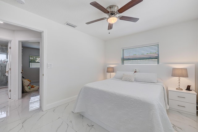 180 NW 18th St, Pompano Beach, FL 33060 - bedroom featuring visible vents, baseboards, ceiling fan, a textured ceiling, and marble finish floor