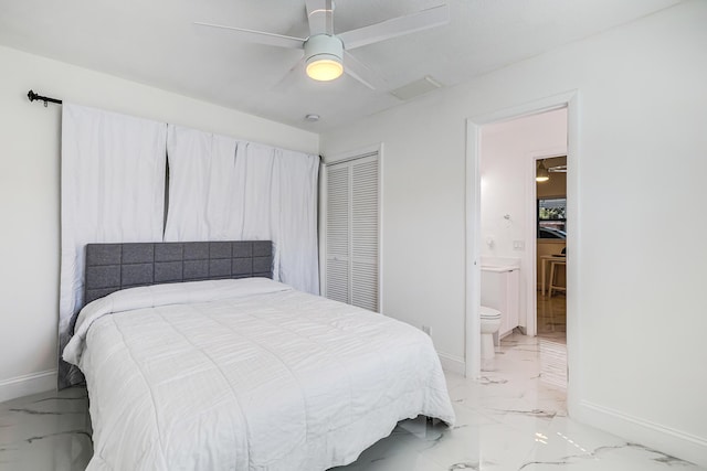 180 NW 18th St, Pompano Beach, FL 33060 - bedroom with a closet, marble finish floor, and baseboards