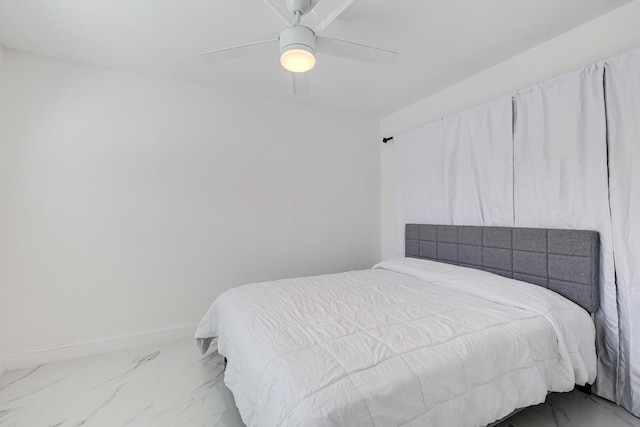180 NW 18th St, Pompano Beach, FL 33060 - bedroom featuring baseboards, a ceiling fan, and marble finish floor