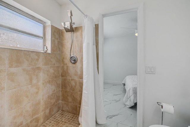 180 NW 18th St, Pompano Beach, FL 33060 - bathroom featuring a tile shower, marble finish floor, and ensuite bath