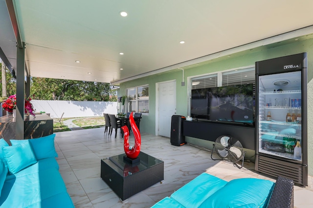 180 NW 18th St, Pompano Beach, FL 33060 - view of patio / terrace with outdoor dining space, an outdoor hangout area, fence, and beverage cooler