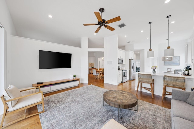 12761 Yardley Dr, Boca Raton, FL 33428 - living room with light wood finished floors, a ceiling fan, visible vents, and recessed lighting