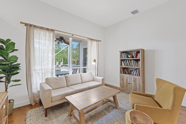 12761 Yardley Dr, Boca Raton, FL 33428 - living area featuring light wood-type flooring, baseboards, and visible vents