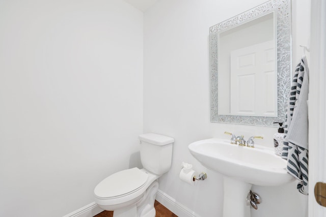 12761 Yardley Dr, Boca Raton, FL 33428 - half bath with toilet and baseboards