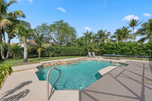 12761 Yardley Dr, Boca Raton, FL 33428 - view of swimming pool featuring a fenced in pool and a patio area