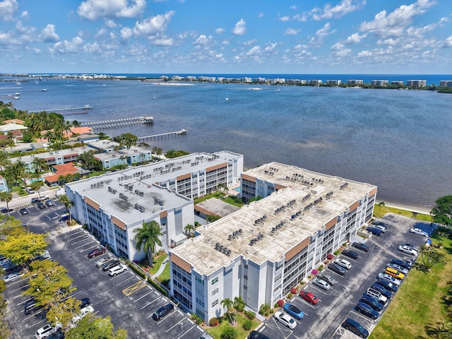 1502 S Lakeside Dr Unit 318, Lake Worth, FL 33460 - drone / aerial view of a large body of water and apartment complex / building