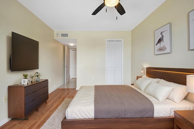 1502 S Lakeside Dr Unit 318, Lake Worth, FL 33460 - bedroom featuring light wood-type flooring, baseboards, a closet, and ceiling fan