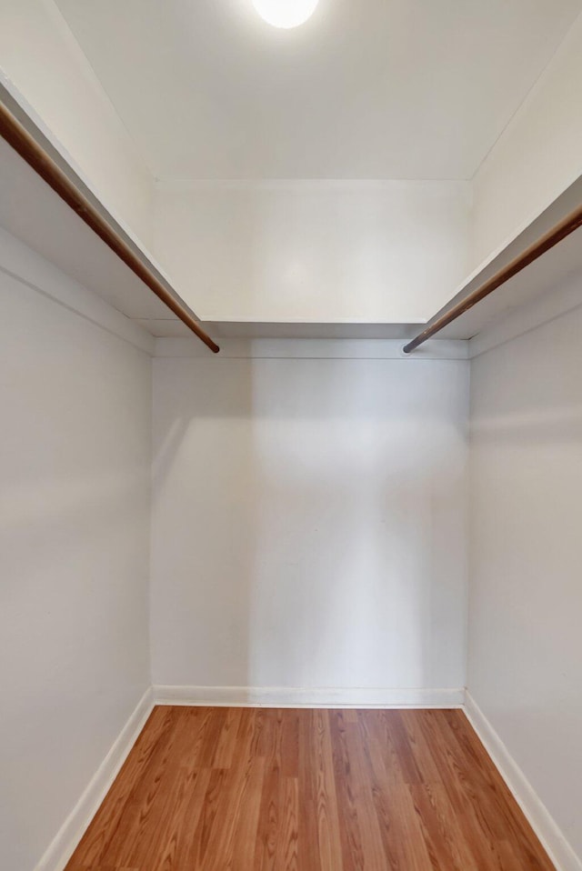 1502 S Lakeside Dr Unit 318, Lake Worth, FL 33460 - spacious closet featuring wood finished floors
