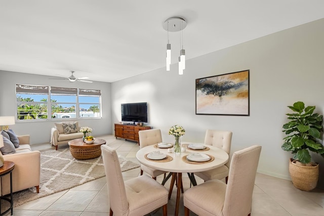 1502 S Lakeside Dr Unit 318, Lake Worth, FL 33460 - dining space with light tile patterned floors and ceiling fan
