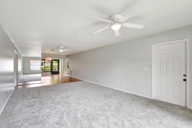 9805 Walnut Tree A Way Unit A, Boynton Beach, FL 33436 - unfurnished living room featuring baseboards, carpet, and ceiling fan