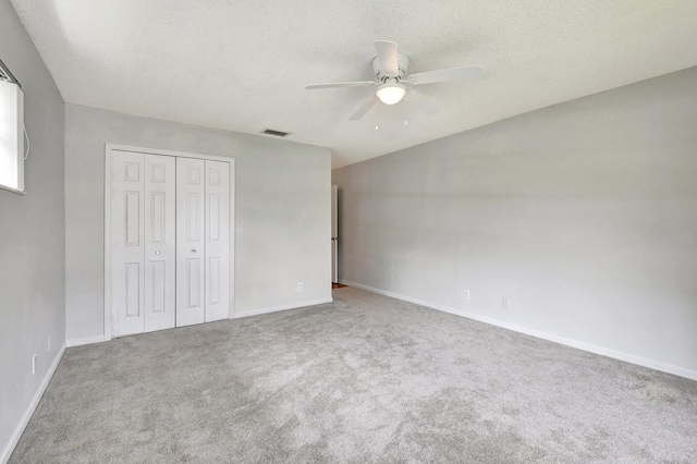 9805 Walnut Tree A Way Unit A, Boynton Beach, FL 33436 - unfurnished bedroom with visible vents, baseboards, carpet floors, and a closet