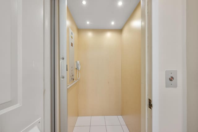 11602 Briarwood Cir Unit 4, Boynton Beach, FL 33437 - elevator featuring recessed lighting