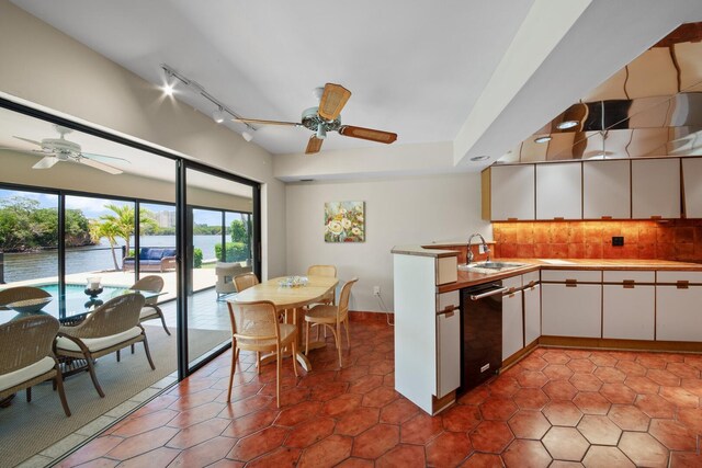 7 Inlet Cay Dr, Ocean Ridge, FL 33435 - kitchen featuring a sink, ceiling fan, a wealth of natural light, and dishwasher