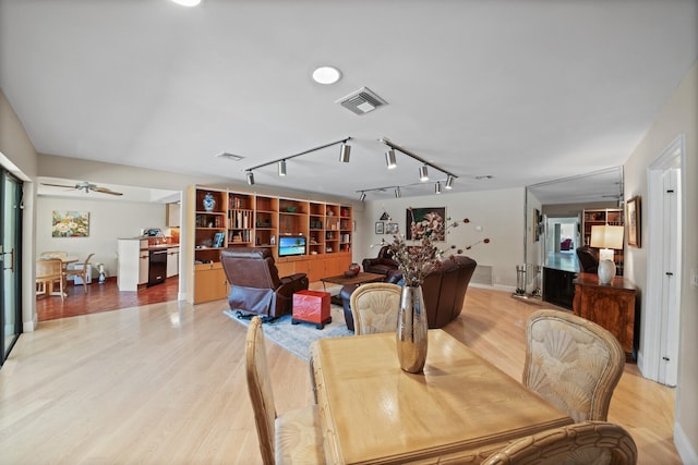 7 Inlet Cay Dr, Ocean Ridge, FL 33435 - dining room featuring track lighting, light wood-style flooring, baseboards, and visible vents