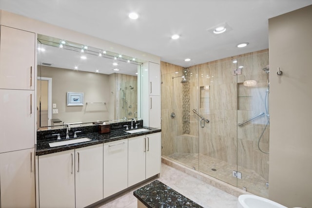 7 Inlet Cay Dr, Ocean Ridge, FL 33435 - bathroom with recessed lighting, visible vents, a shower stall, and a sink