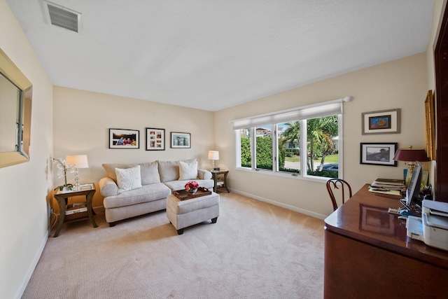 7 Inlet Cay Dr, Ocean Ridge, FL 33435 - living room featuring light colored carpet, visible vents, and baseboards