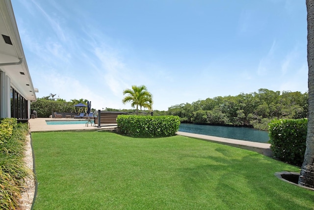 7 Inlet Cay Dr, Ocean Ridge, FL 33435 - view of yard featuring a water view and a fenced in pool