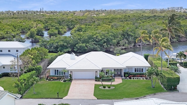7 Inlet Cay Dr, Ocean Ridge, FL 33435 - aerial view with a water view and a forest view