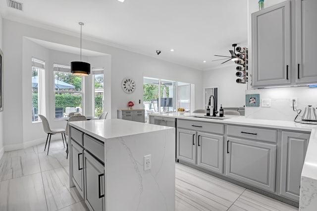 8086 Bautista Way, Palm Beach Gardens, FL 33418 - kitchen with a sink, gray cabinetry, and visible vents