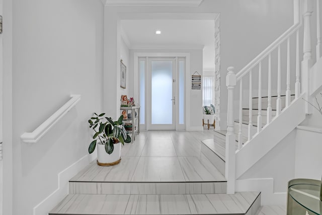 8086 Bautista Way, Palm Beach Gardens, FL 33418 - entryway featuring crown molding, baseboards, and stairs