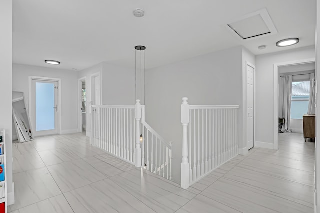 8086 Bautista Way, Palm Beach Gardens, FL 33418 - corridor with baseboards and an upstairs landing