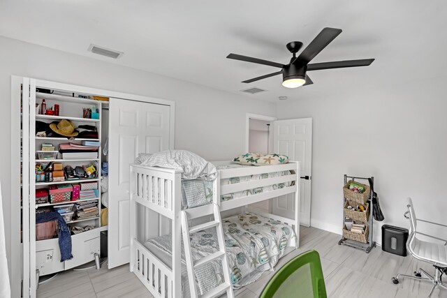 8086 Bautista Way, Palm Beach Gardens, FL 33418 - bedroom featuring visible vents, ceiling fan, light tile patterned flooring, and a closet