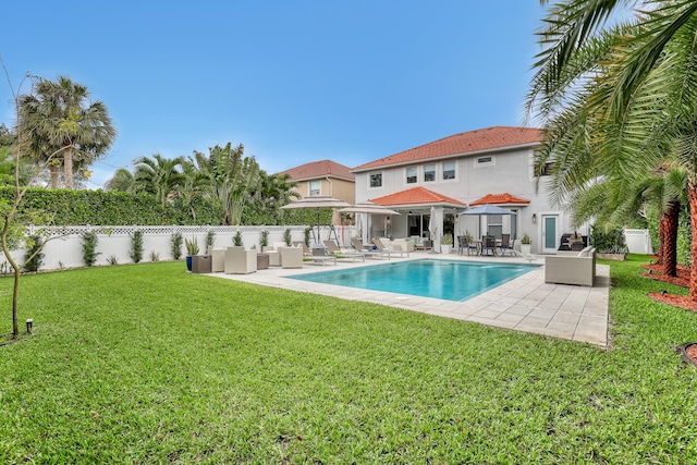 8086 Bautista Way, Palm Beach Gardens, FL 33418 - view of pool with a fenced backyard, a fenced in pool, an outdoor living space, a patio area, and a yard