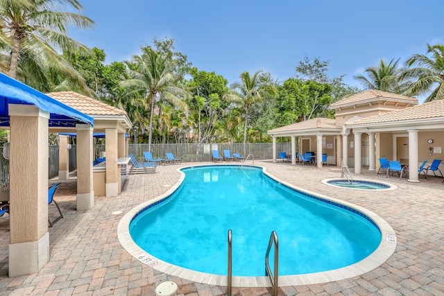8086 Bautista Way, Palm Beach Gardens, FL 33418 - community pool with fence, a patio, a gazebo, and a community hot tub